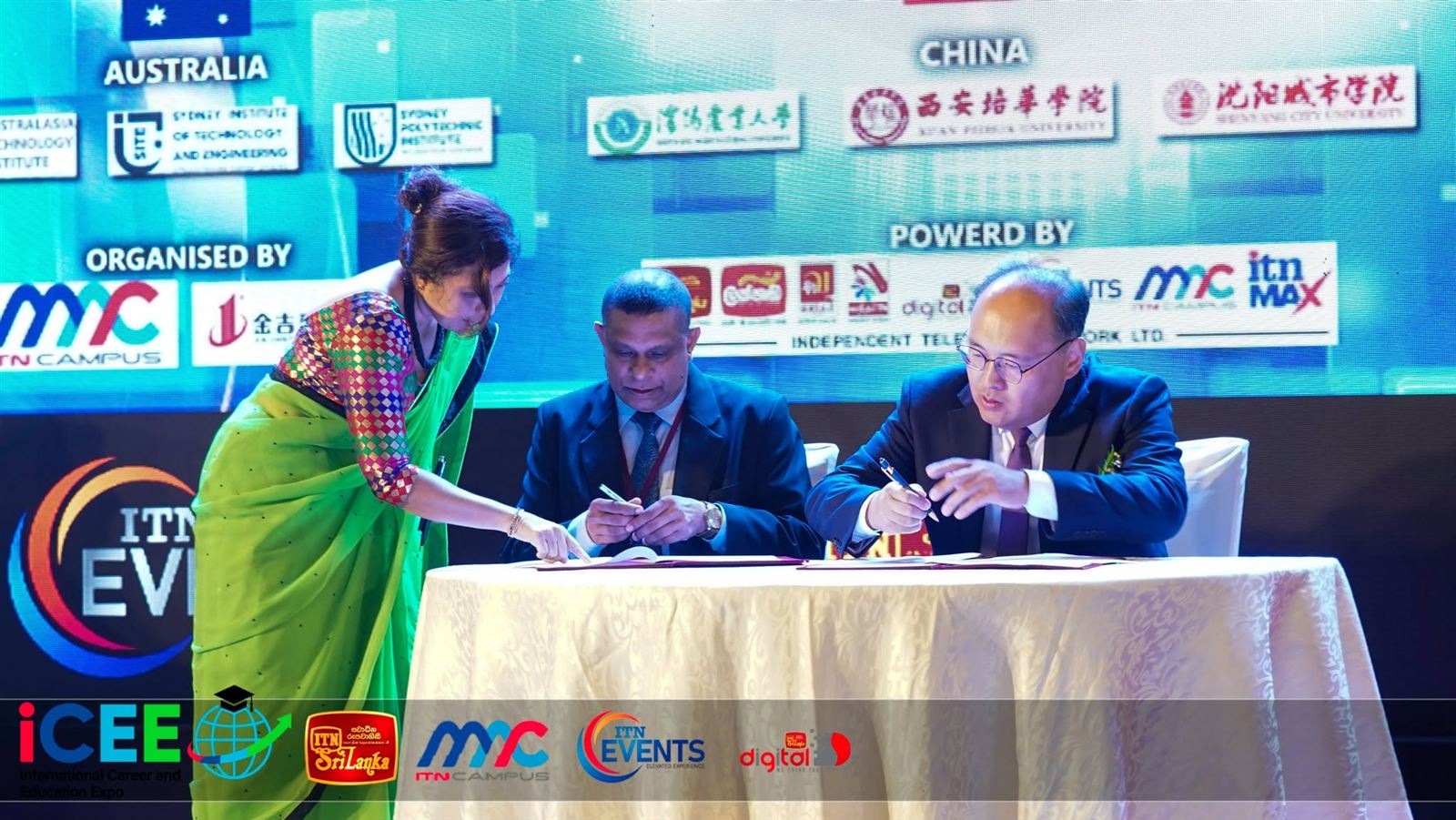 Letter of Intent signing on stage